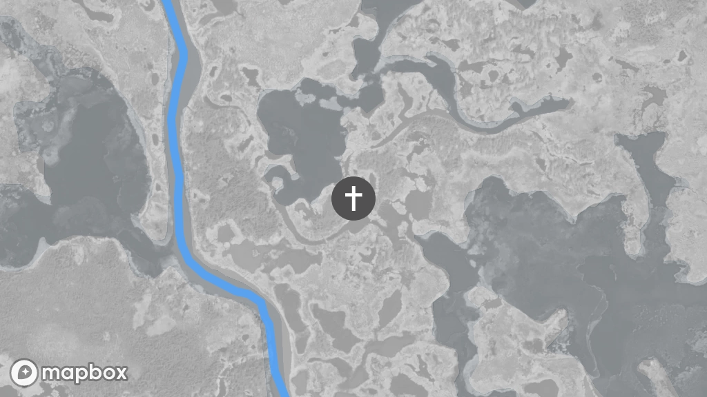A satellite image of a gravesite located on the shore of a small lake near Marian River.