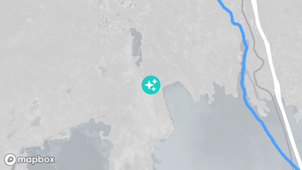 A satellite image of a mountain on the shore of Marian Lake, west of Marian Village.